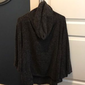 Brown/charcoal poncho sweater.